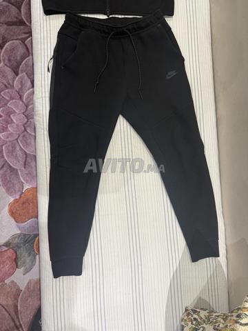 طقم نايكي تك فليس أسود أصلي - 2