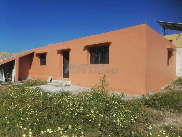 Terrain agricole avec maison et puits