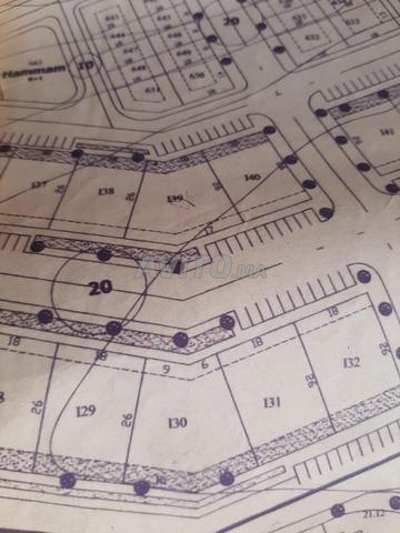 قطعة أرض R4 رياض تلال 574 م² واجهتان للبيع.