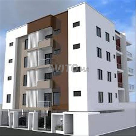 Terrain 2300 m2 titre R4 3 façades 3 immeubles