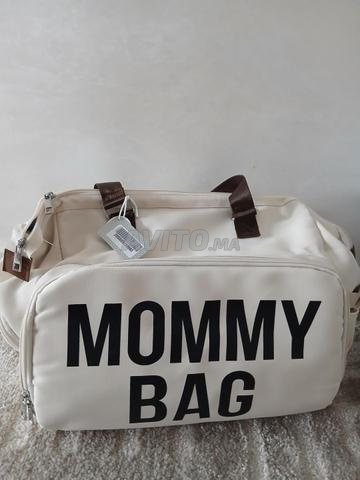 حقيبة أم وطفل