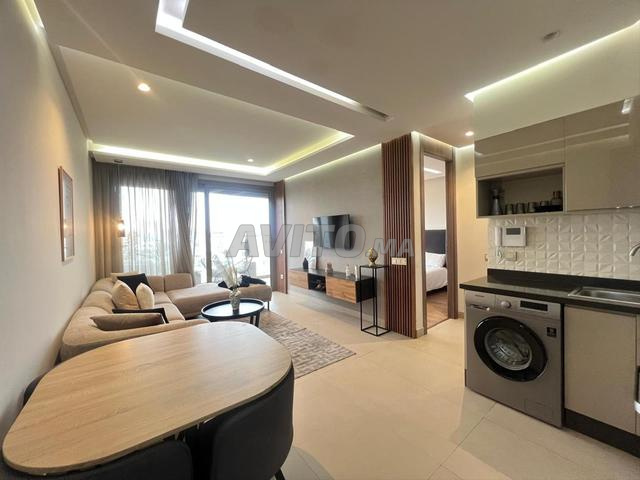 À louer studio - Oasis - vue sur terrain de football  - image 4