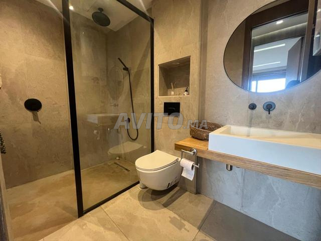 À louer studio - Oasis - vue sur terrain de football  - image 5