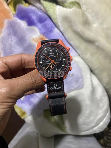 Swatch Omega The Earth Lava Original - 2