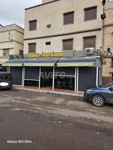 مقهى كامل و 4 شقق - 2