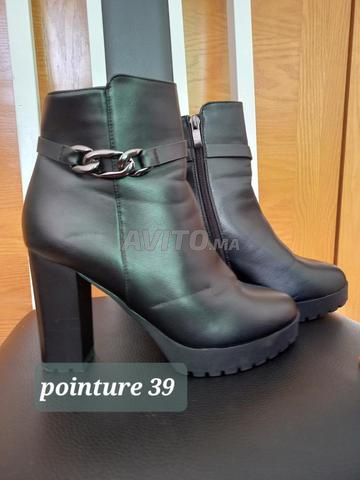 2 bottes noires à talons - 2