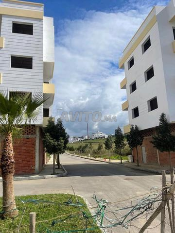 قطعة أرض بمساحة 100 متر مربع، طريق 12 متر، الطابق الأرضي + 2، تجزئة بويتينا في عوامة طنجة