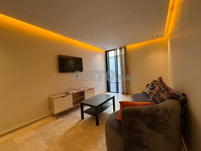 Location studio meublé 64 m² RDC avec terrasse