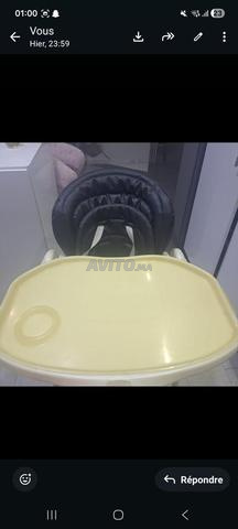 كرسي مرتفع للأطفال