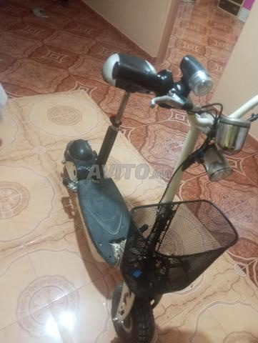سكوتر كهربائي يحتاج بطارية - 2