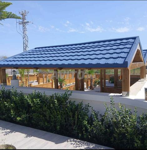 القرمود المعدني المغلف بالحصى - 2