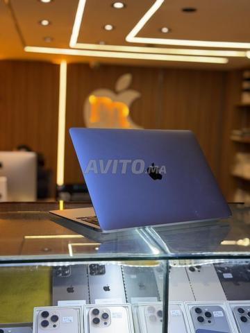 ماك بوك اير ام 1 256 جي - 2
