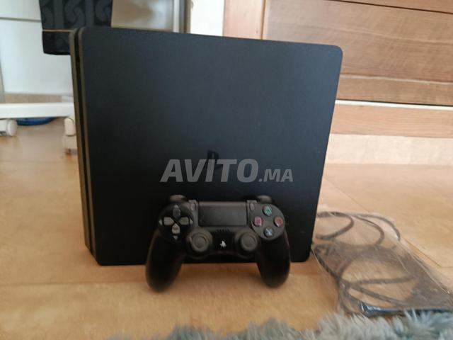 PS4 slim bon état - 2
