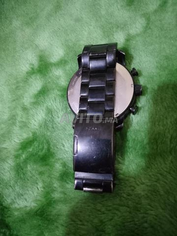 ساعة فوسيل باللون الأسود الفولاذي للرجال - 2