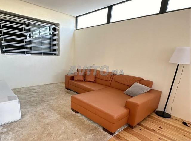 أريكة بنية جلدية - 2