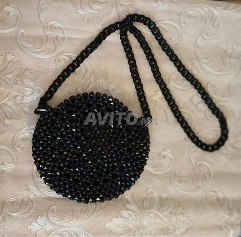 حقيبة خرز (عقيق) باللون الأسود