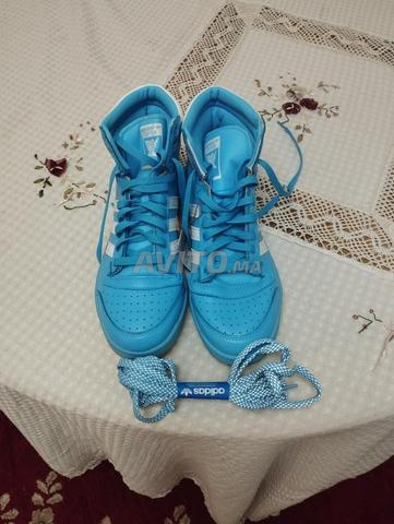 أديداس توب تن