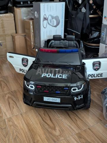 سيارة شرطة بضوء وصفارة وتحكم عن بعد - 2