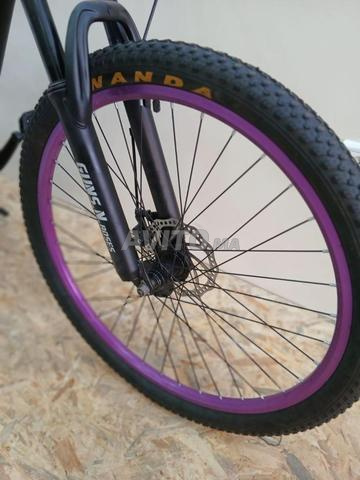 🚴‍♂️ Vivez l'aventure avec le Vélo VTT Guns N’ Roses - 2