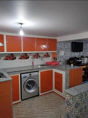 Maison avec magasin industriel