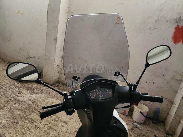 دراجة نارية بيجو 4 أشواط - 2