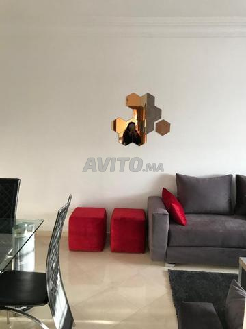 كنب، مسند قدم، سجادة وطاولة قهوة