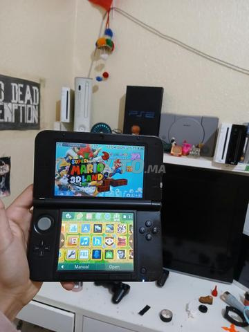 Nintendo 3DS xl معدلة 16 جيجا مع 50 لعبة