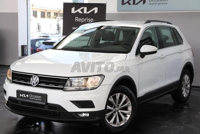 KIA - VOLKSWAGEN Tiguan