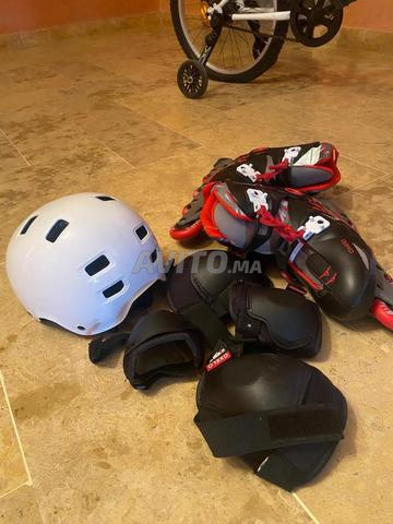 بيع رولر أوكسيلو للأولاد مقاس 34-36 مع خوذة
