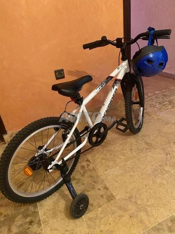 Vends vélo VTT ST 100 roue 27,5'' avec stabilisateur