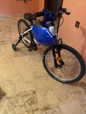 Vends vélo VTT ST 100 roue 27,5'' avec stabilisateur - 2