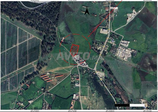 Terrain à d3id3at près de station SDFM de transport