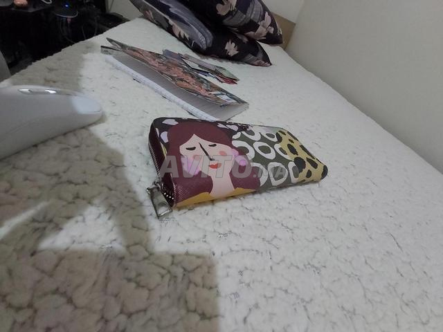 محفظة نقود ماركة أحياناً - 2