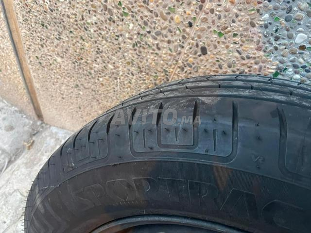 أربع عجلات للبيع بحالة كالجديدة - 2