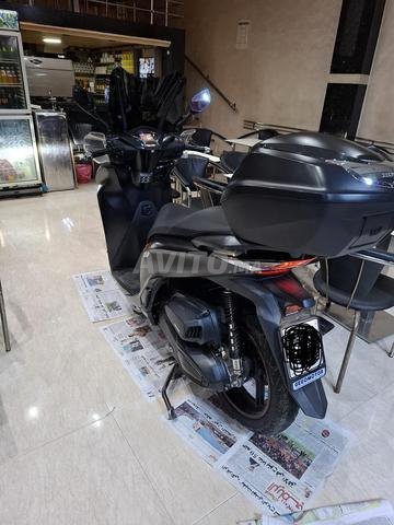 SH350i دراجة نارية لا تزال جديدة، ما شاء الله.