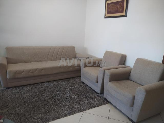 Canapé clic clac avec rangement