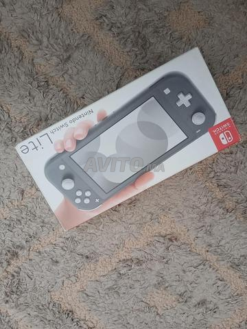 Nintendo Switch Lite comme neuve - 2