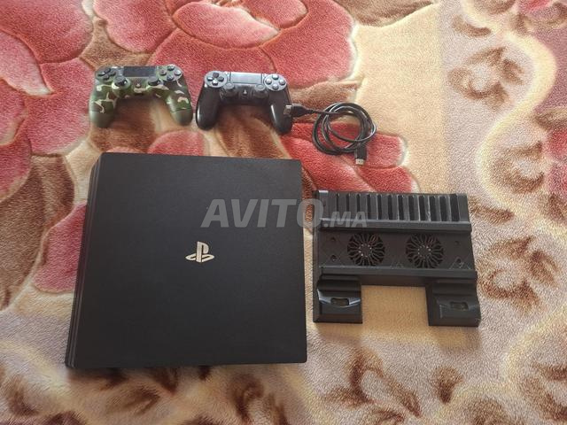 PS 4 PRO, 2 MANETTES, 21 JEUX - 2