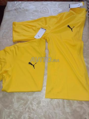 بدلة رياضية زرقاء وصفراء - 2