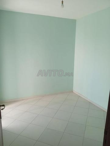 Appartement propre dans un immeuble gardé à louer - image 4