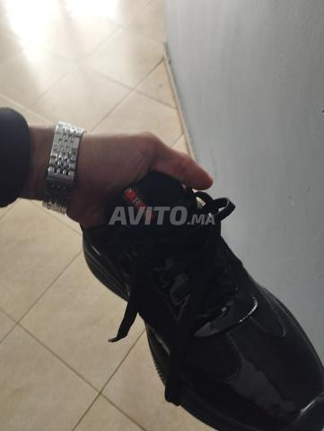 Prada America bon état