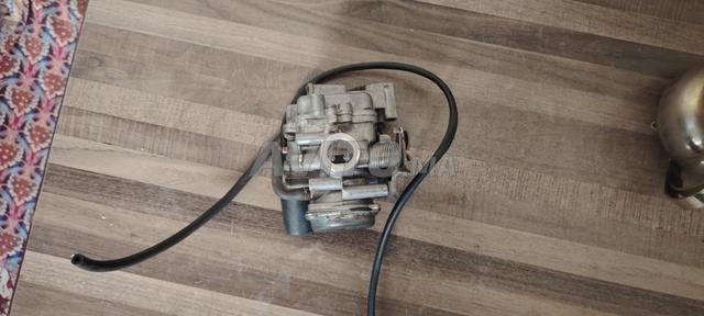 Carburateur Kymco en excellent état