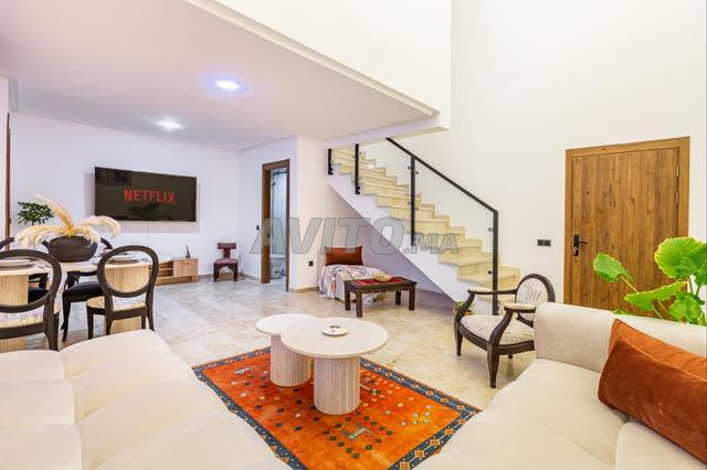 Duplex de luxe à louer au cœur de Guéliz piscine - image 4