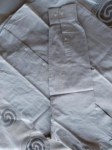 Chemise Bleu-gris clair. - 2