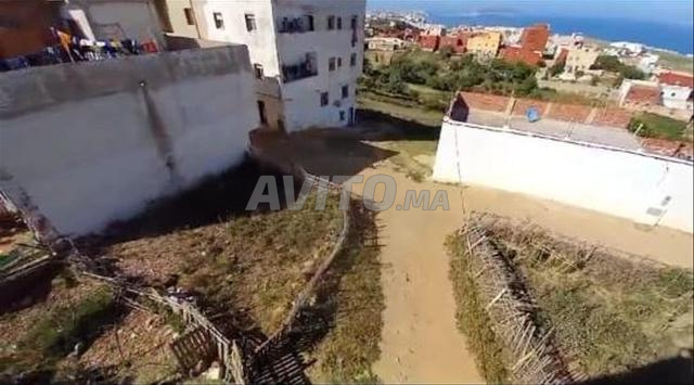 قطعة أرضية محفظة بالفنيدق - 2