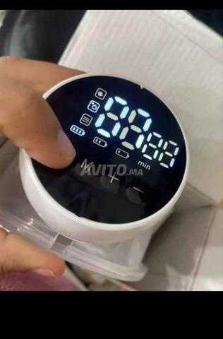 Tire lait électrique main libre