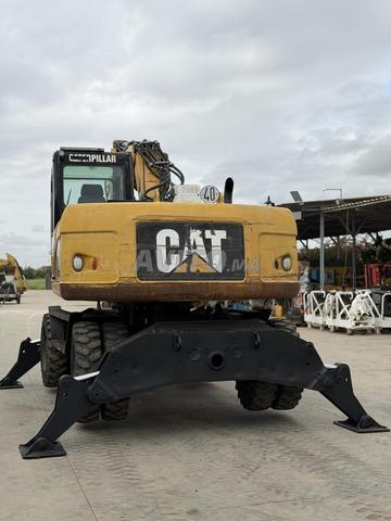 حفارة بعجلات كاتربيلر M318D - 2