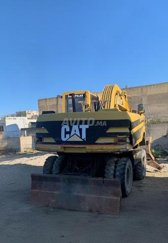 Pelle sur pneus Caterpillar M318 pure - 2