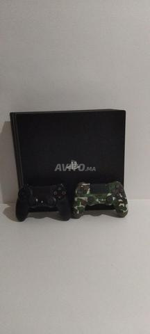 بلاي ستيشن 4 برو 1 تيرابايت مع وحدتي تحكم - 2