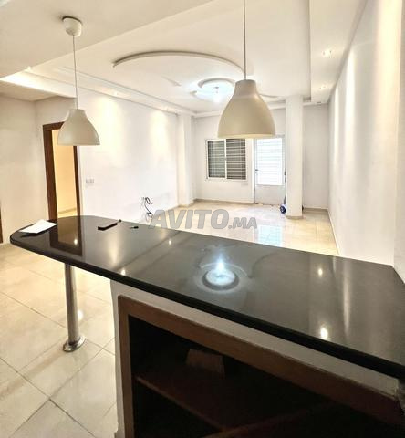 Appartement de 60 m2 au rez-de-chaussée - image 5